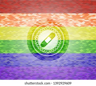 bandage plaster icon inside emblem on mosaic background with the colors of the LGBT flag
