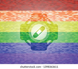 bandage plaster icon inside emblem on mosaic background with the colors of the LGBT flag