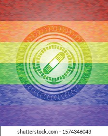 bandage plaster icon inside emblem on mosaic background with the colors of the LGBT flag