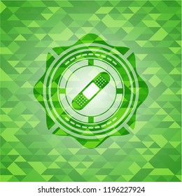 bandage plaster icon inside green emblem. Mosaic background