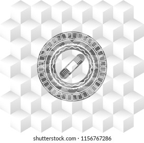 bandage plaster icon inside grey badge with geometric cube white background