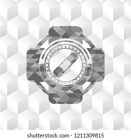 bandage plaster icon inside grey badge with geometric cube white background