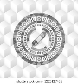 bandage plaster icon inside grey icon or emblem with geometric cube white background