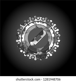 bandage plaster icon inside grey camouflaged emblem