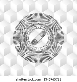 bandage plaster icon inside grey emblem with geometric cube white background