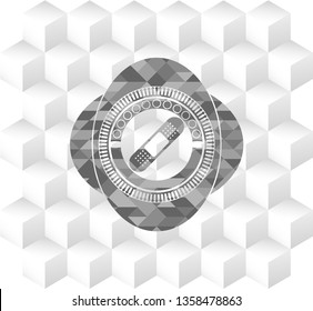 bandage plaster icon inside grey icon or emblem with geometric cube white background