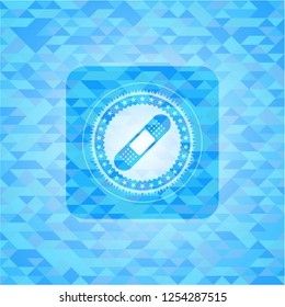 bandage plaster icon inside light blue emblem with triangle mosaic background