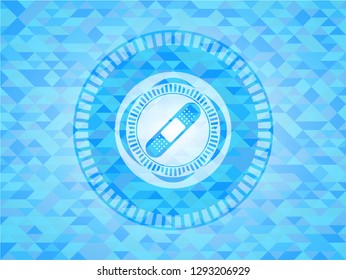 bandage plaster icon inside light blue emblem. Mosaic background