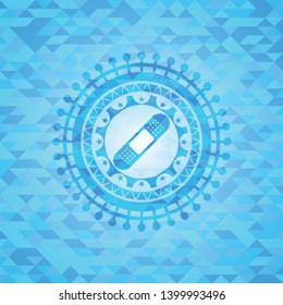bandage plaster icon inside light blue emblem with mosaic ecological style background