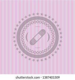 bandage plaster icon inside pink icon or emblem