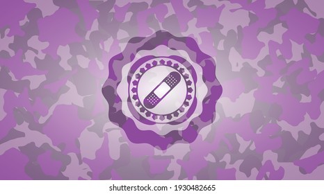 Bandage Plaster Icon Inside Pink And Purple Camo Texture. 