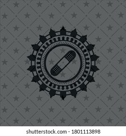 bandage plaster icon inside realistic black emblem. 
