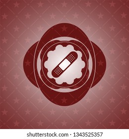 bandage plaster icon inside red icon or emblem