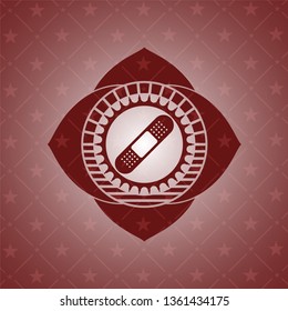 bandage plaster icon inside red icon or emblem