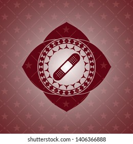 bandage plaster icon inside red icon or emblem