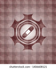 bandage plaster icon inside red seamless badge with geometric pattern background.