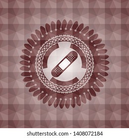 bandage plaster icon inside red seamless geometric emblem.