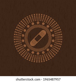 bandage plaster icon inside retro wooden emblem. 