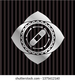 bandage plaster icon inside silver emblem or badge