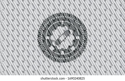bandage plaster icon inside silver emblem or badge. Scales pattern. Vector Illustration. Detailed.