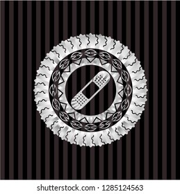 bandage plaster icon inside silvery badge