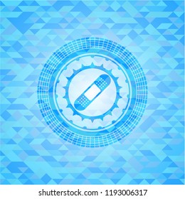 bandage plaster icon inside sky blue emblem with triangle mosaic background