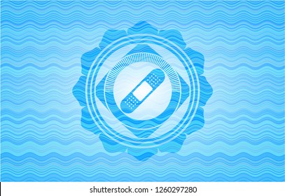 bandage plaster icon inside water style badge.