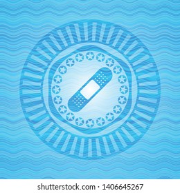 bandage plaster icon inside water wave emblem.