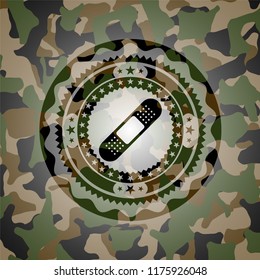 bandage plaster icon on camouflaged pattern