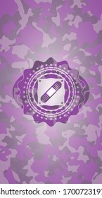 bandage plaster icon on pink and purple camouflaged pattern