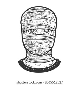 bandaged head sketch engraving vector illustration. T-shirt apparel print design. Scratch board imitation. Black and white hand drawn image.