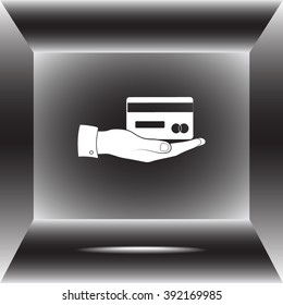 Bank credit card on hand sign icon, vector illustration. Flat design style 