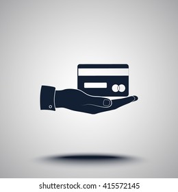 Bank credit card on hand sign icon, vector illustration. Flat design style 