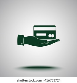 Bank credit card on hand sign icon, vector illustration. Flat design style 