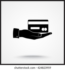 Bank credit card on hand sign icon, vector illustration. Flat design style 