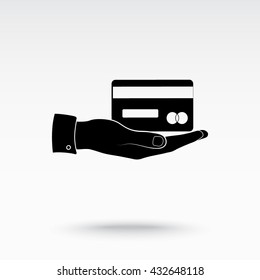 Bank credit card on hand sign icon, vector illustration. Flat design style 
