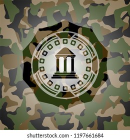 bank icon inside camouflaged emblem