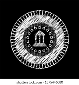 bank icon inside chalk emblem written on a blackboard