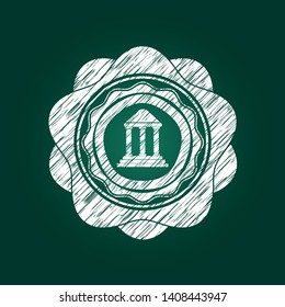 bank icon inside chalk emblem written on a blackboard