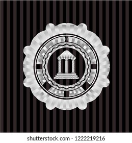 bank icon inside silver emblem