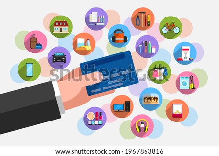 Bank plastic card in person's hand and plenty of icons of goods around it. Concept of purchasing power, cashless payment for goods and services, purchases on credit