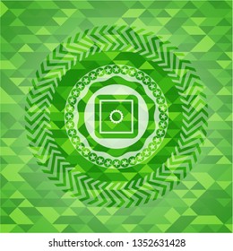 bank safe icon inside green emblem with mosaic background
