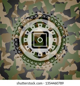 bank safe icon on camouflage pattern
