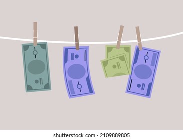 Banknote bills drying pinned on a clothesline, a money laundry concept