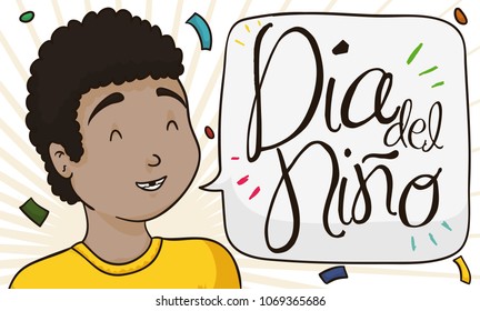 Banner with brunette toothless boy celebrating Children's Day (written in Spanish) under a confetti shower with a greeting speech.