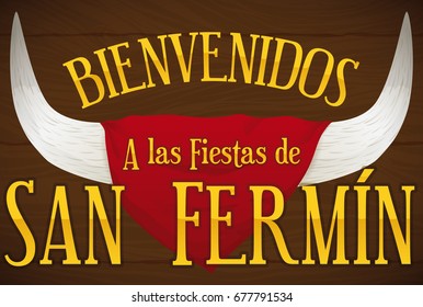 Banner with bull horns behind a red handkerchief and greeting message over a wooden sign to celebrate San Fermin (written in Spanish).
