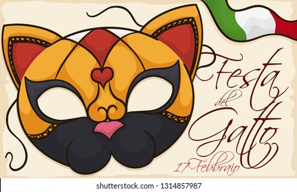 Banner with festive Venetian mask like feline face over a scroll with Italy flag to celebrate Cat Day (written in Italian).