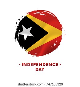 Banner or poster of East Timor Independence Day celebration. Waving flag of East Timor, brush stroke background. Vector illustration.