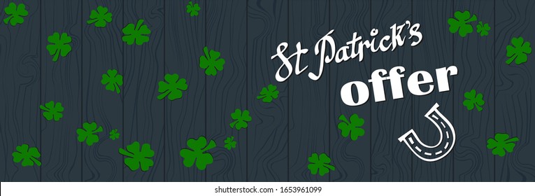 Banner with special offer for St Patricks Day. Vector illustration with  lettering "St Patrick's day offer" with green shamrocks on a dark textured wooden background. Concept for sales on St. Patrick.