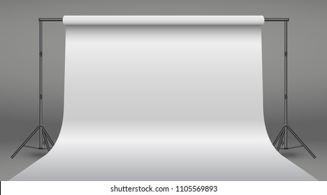 Banner stand with white paper backdrop. Realistic Photo Studio